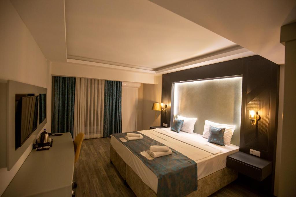 Postel nebo postele na pokoji v ubytování ANYA RESORT HOTEL