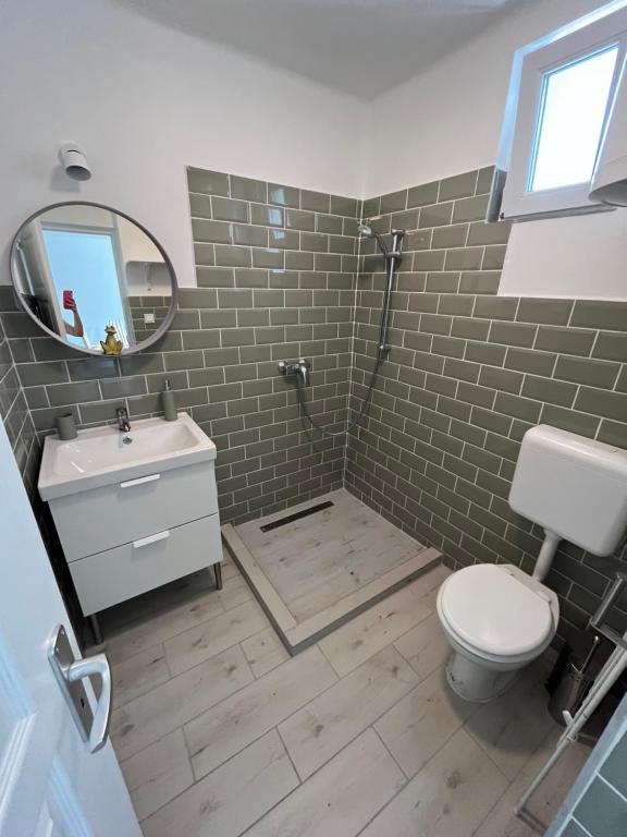 Łazienka w obiekcie Helló Zsóry Apartman
