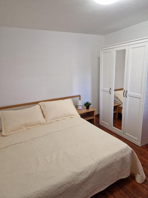 Postel nebo postele na pokoji v ubytování Apartment Misic