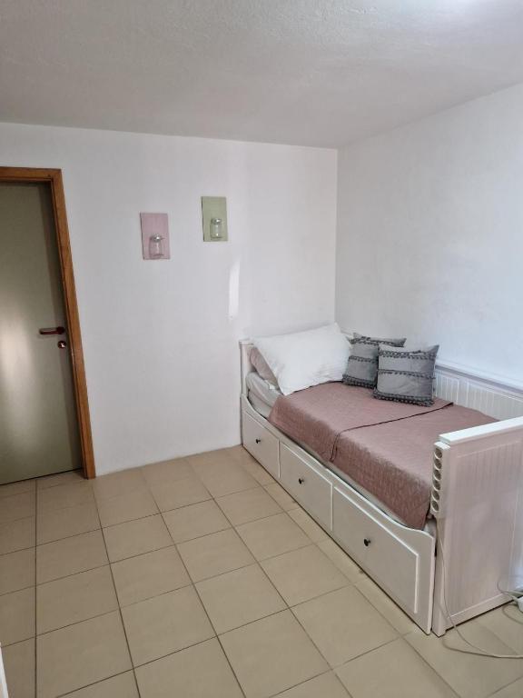 Postel nebo postele na pokoji v ubytování Apartment Misic