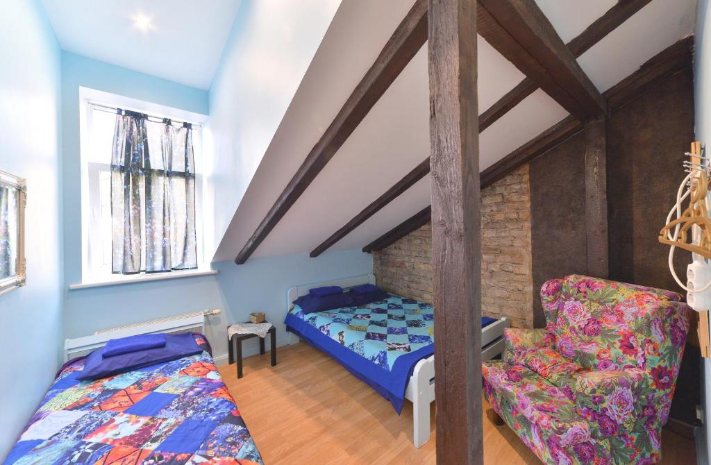 Postel nebo postele na pokoji v ubytování Central Hostel