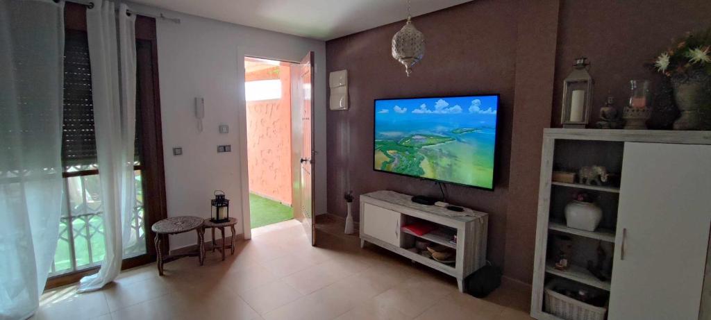 TV a/nebo společenská místnost v ubytování La Invencible Terreros en 1ª Línea de Playa