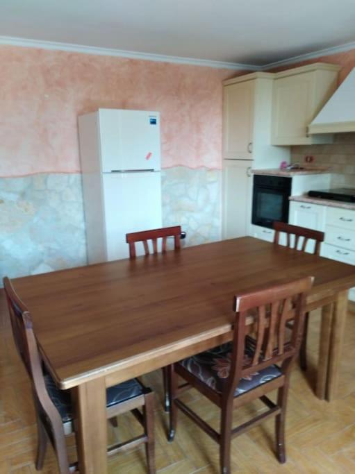 Kuchyň nebo kuchyňský kout v ubytování La tavernetta a Trinitapoli