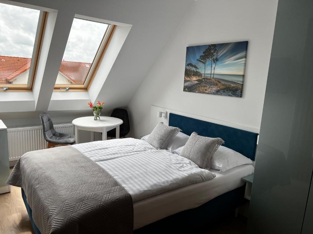 Postel nebo postele na pokoji v ubytování WILLA LAZUR