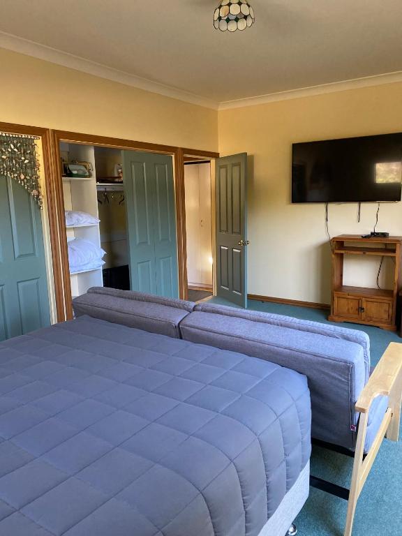 Postel nebo postele na pokoji v ubytování Abel Tasman Marahau