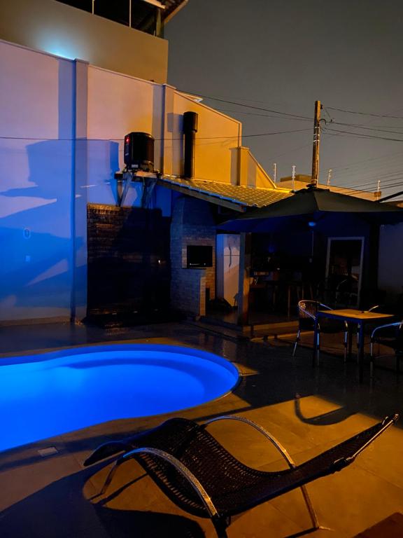 Bazén v ubytování Casa no centro de Balneário Camboriú nebo v jeho okolí