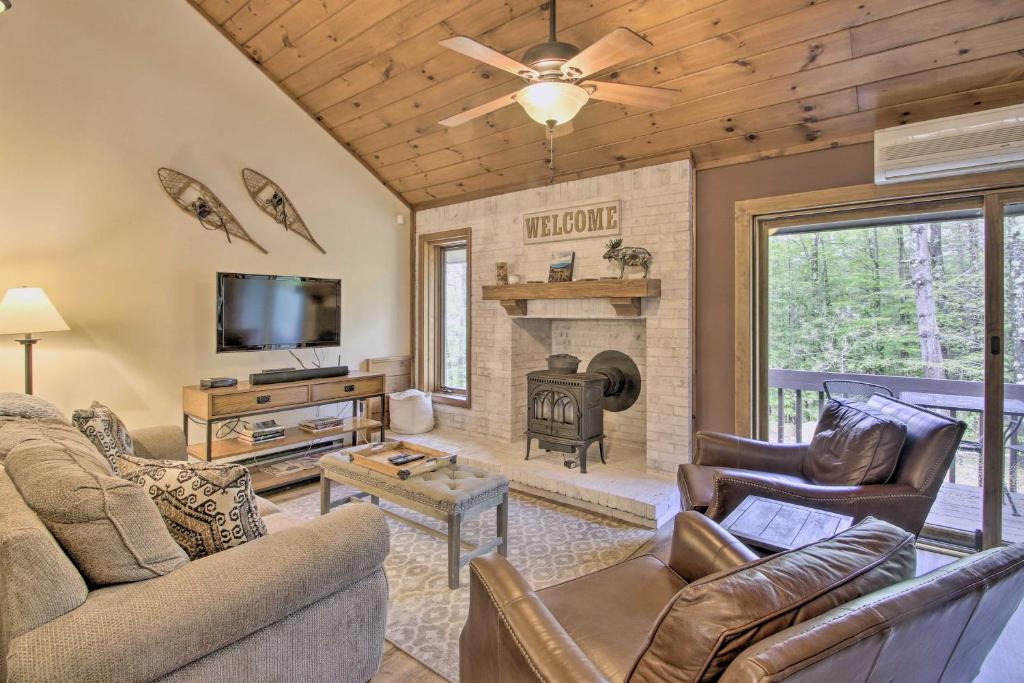 A seating area at Updated N Conway Retreat Near Hiking and Shopping!
