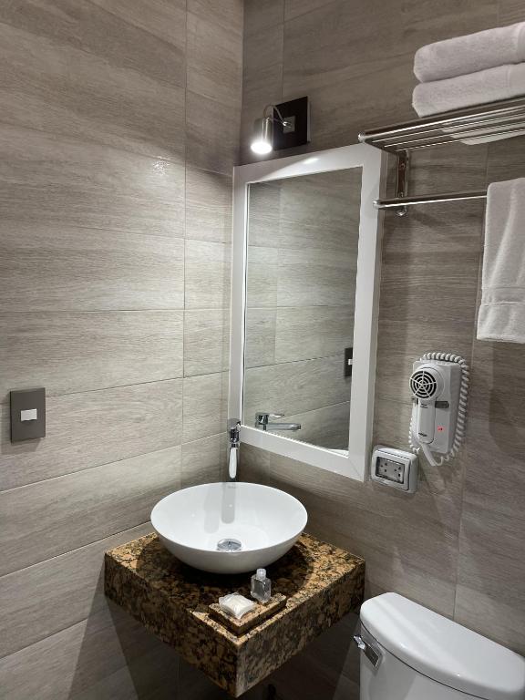 Koupelna v ubytování Rado Hotel - Quintanas