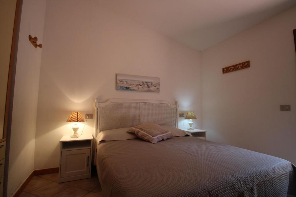 Łóżko lub łóżka w pokoju w obiekcie Casa Mira con piscina e bellissima vista mare