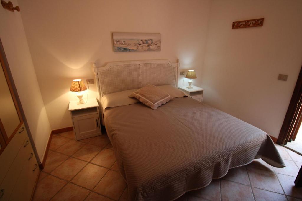 Łóżko lub łóżka w pokoju w obiekcie Casa Mira con piscina e bellissima vista mare