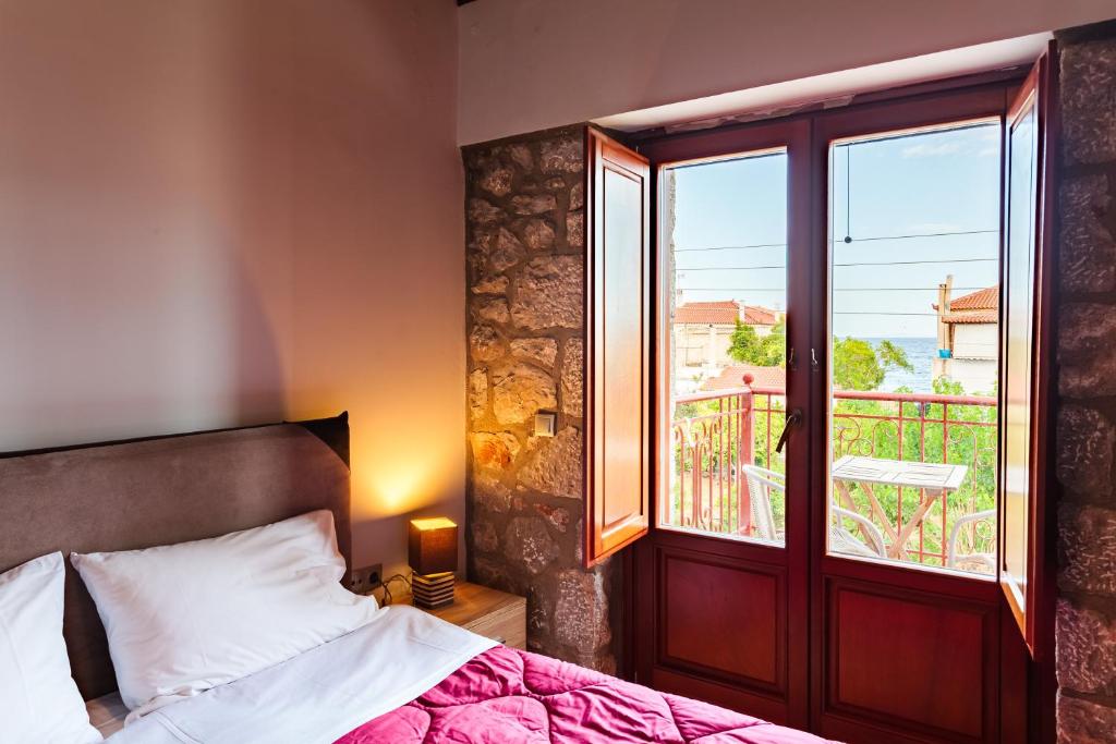 Postel nebo postele na pokoji v ubytování Seaside Dukes Villas