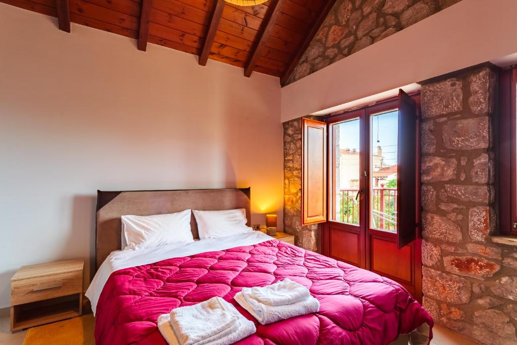 Postel nebo postele na pokoji v ubytování Seaside Dukes Villas