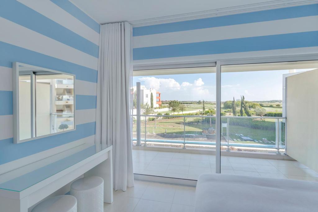 Een bed of bedden in een kamer bij Laguna - Vilamoura