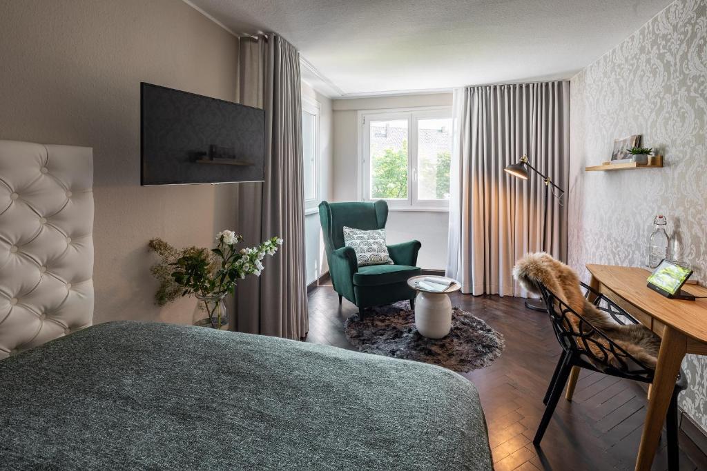 TV a/nebo společenská místnost v ubytování Ganter Hotel & Restaurant Mohren