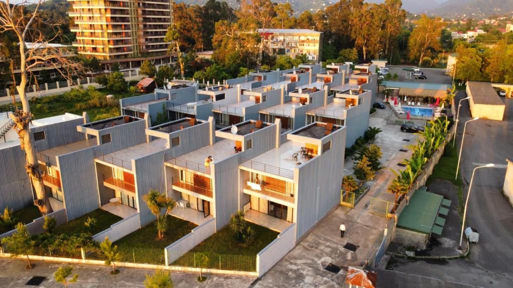 an aerial view of a building in a city at Seaside cottages in Chakvi