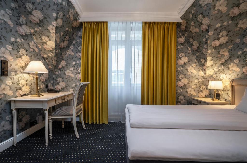 Postel nebo postele na pokoji v ubytování Thon Hotel Sandven