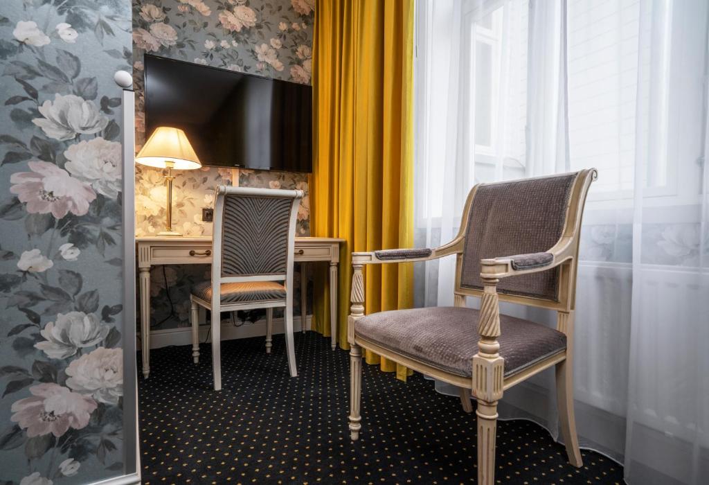 TV a/nebo společenská místnost v ubytování Thon Hotel Sandven