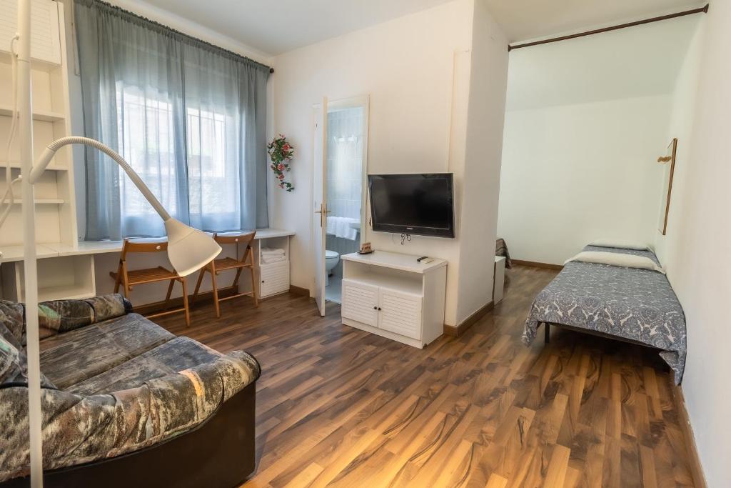 TV a/nebo společenská místnost v ubytování Fonda Can Dalfo by Vivere Stays
