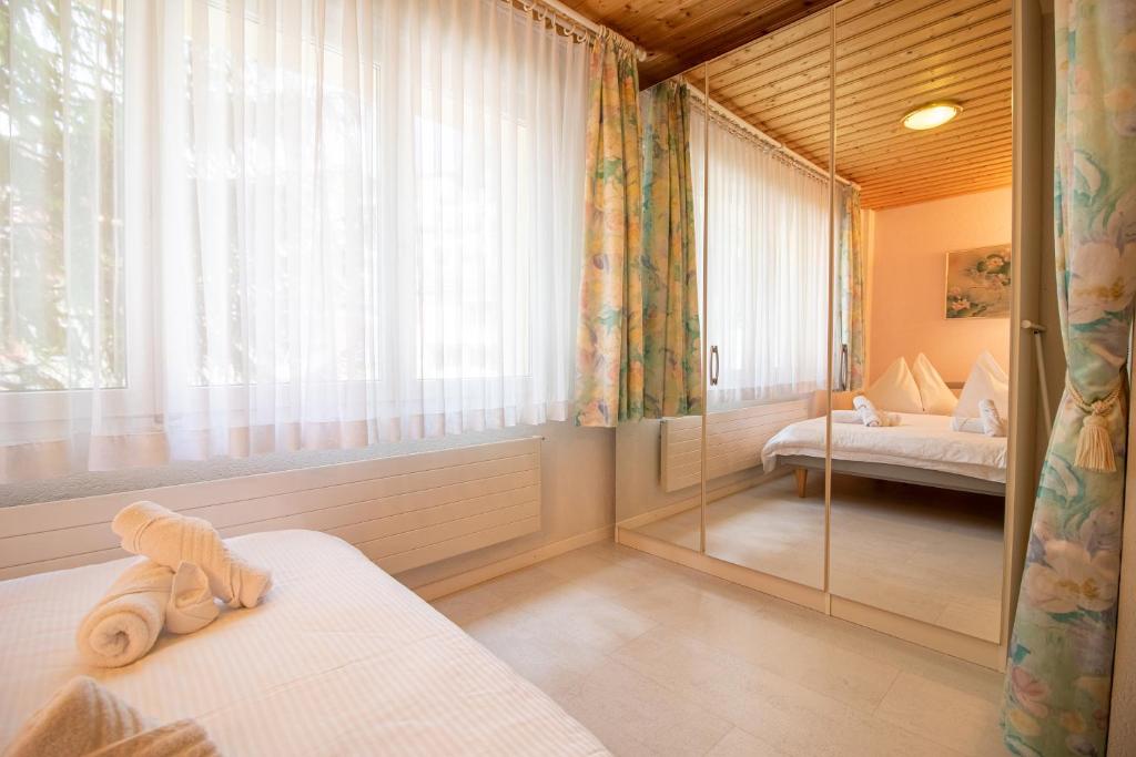 Postel nebo postele na pokoji v ubytování Haus Padrun 1
