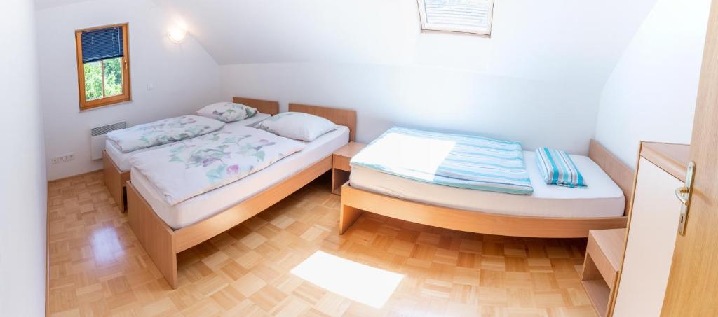 Postel nebo postele na pokoji v ubytování House Parabola