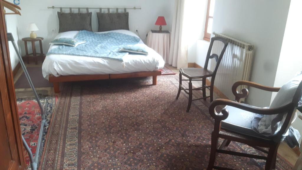 Posteľ alebo postele v izbe v ubytovaní La maison de grand-mère Angèle