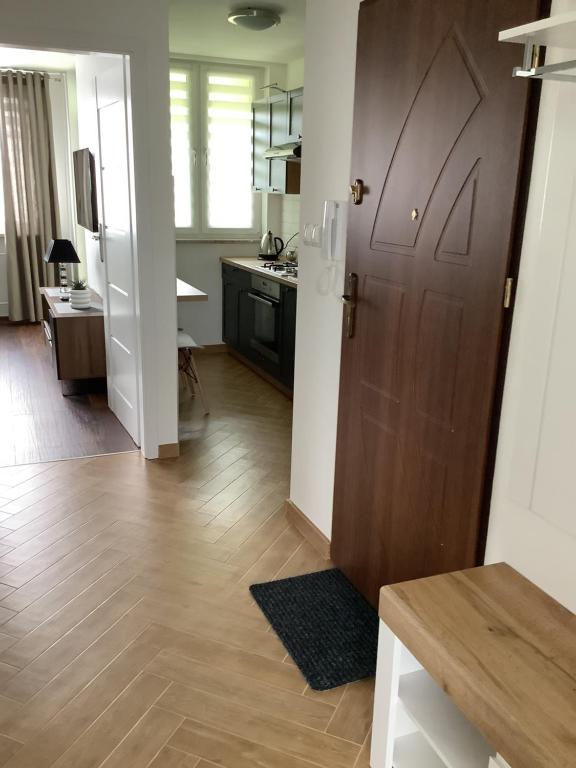 Kuchyňa alebo kuchynka v ubytovaní Pogodne Centrum