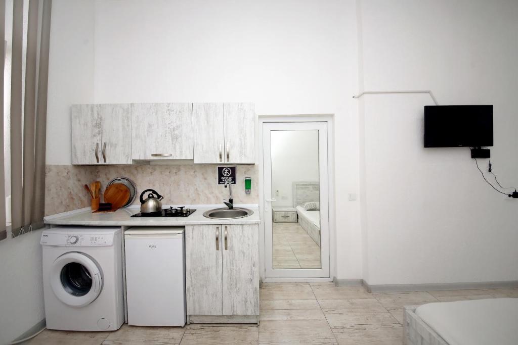 Kuchyň nebo kuchyňský kout v ubytování Hostel Mandaria