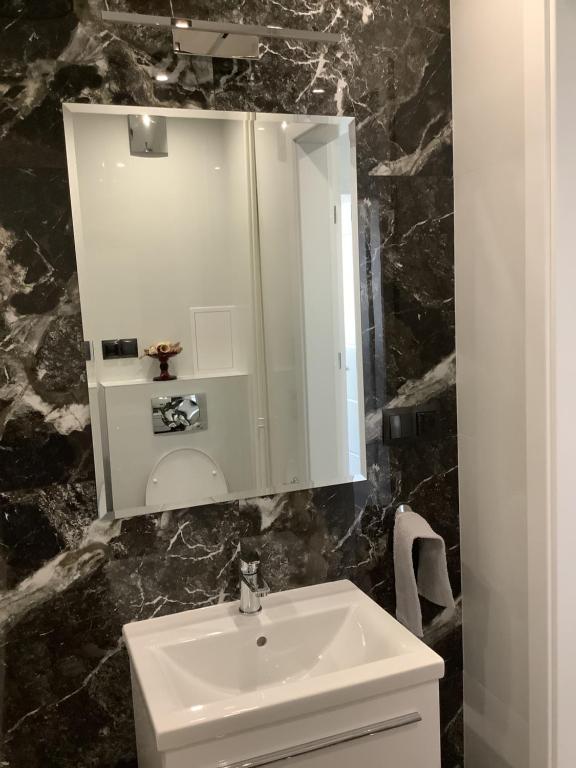 Kúpeľňa v ubytovaní Pogodne Centrum