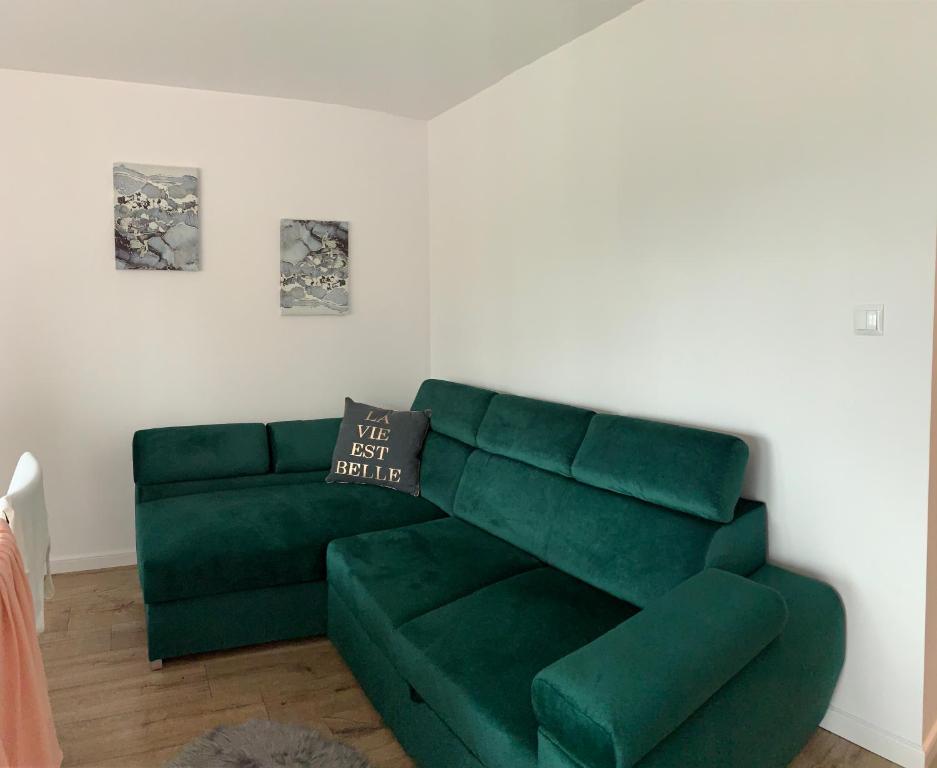Posedenie v ubytovaní Apartament Wiżajny