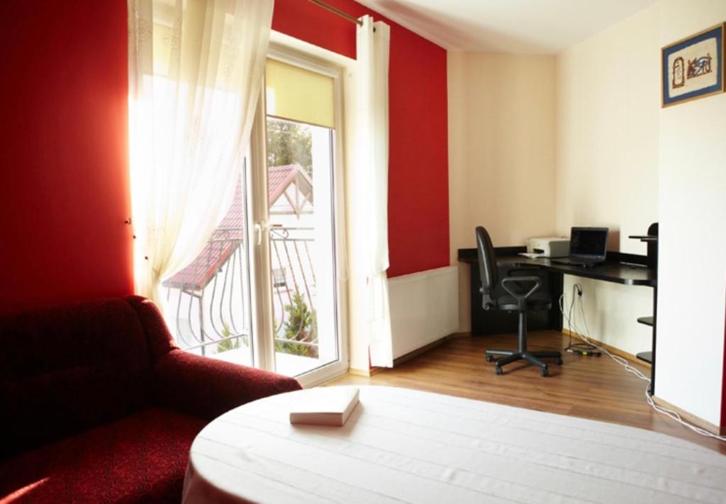 Postel nebo postele na pokoji v ubytování Dom na Wzgórzu