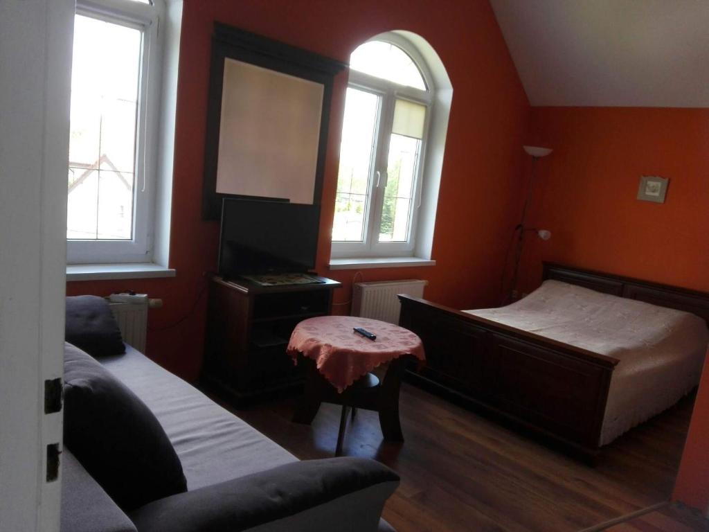 Postel nebo postele na pokoji v ubytování Dom na Wzgórzu