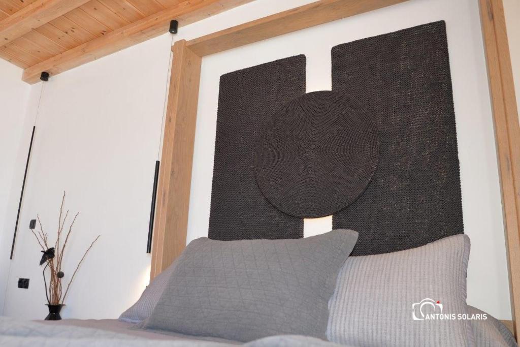 Postel nebo postele na pokoji v ubytování Nisaki Hotel & Elite Suites