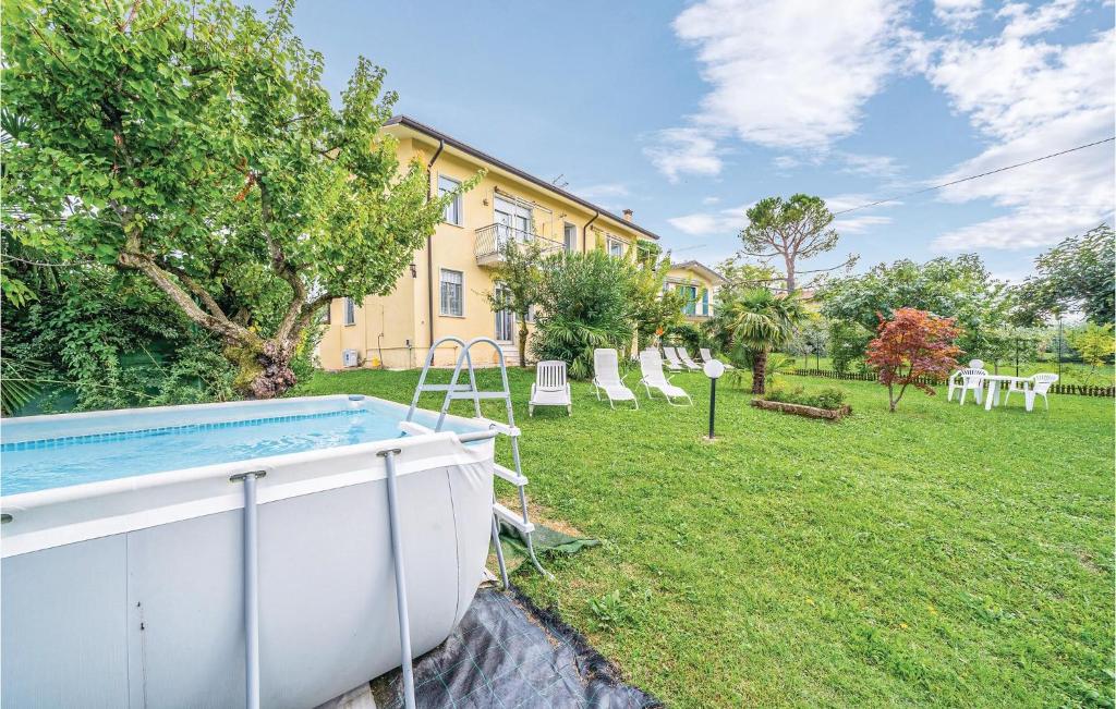 a pool in the yard of a house at Casa Katia in Lazise