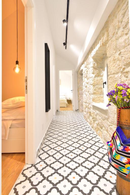 Posteľ alebo postele v izbe v ubytovaní Charming and Authentic Stone Villa Stanić
