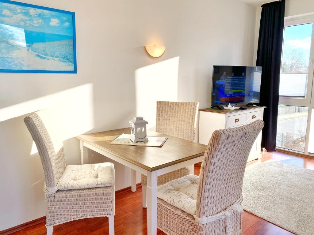 TV a/nebo společenská místnost v ubytování Hafenresidenz - Ferienwohnung 31