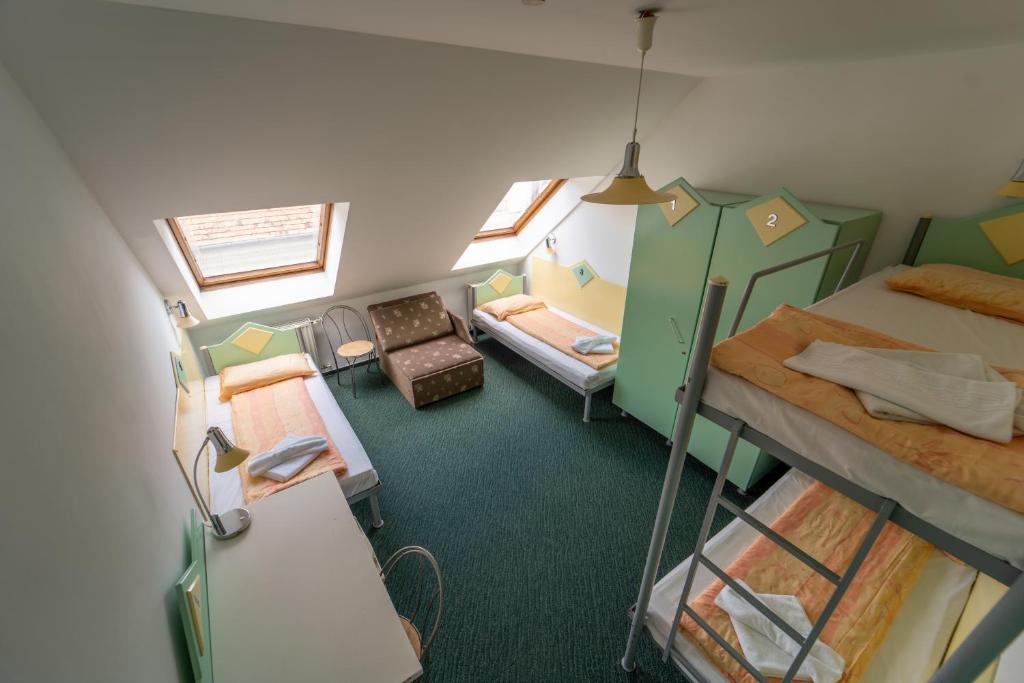 Postel nebo postele na pokoji v ubytování MP Hostel Budapest