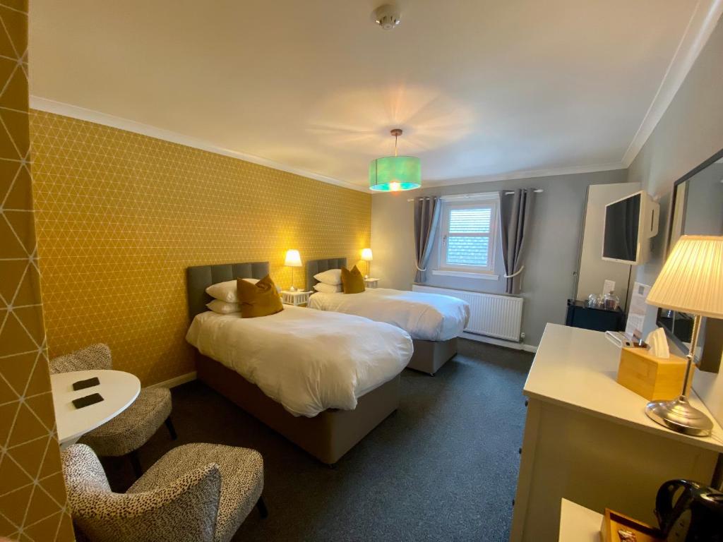 Ein Bett oder Betten in einem Zimmer der Unterkunft Barriemore Oban