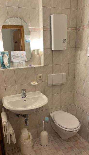 Koupelna v ubytování Hotel Fortuna