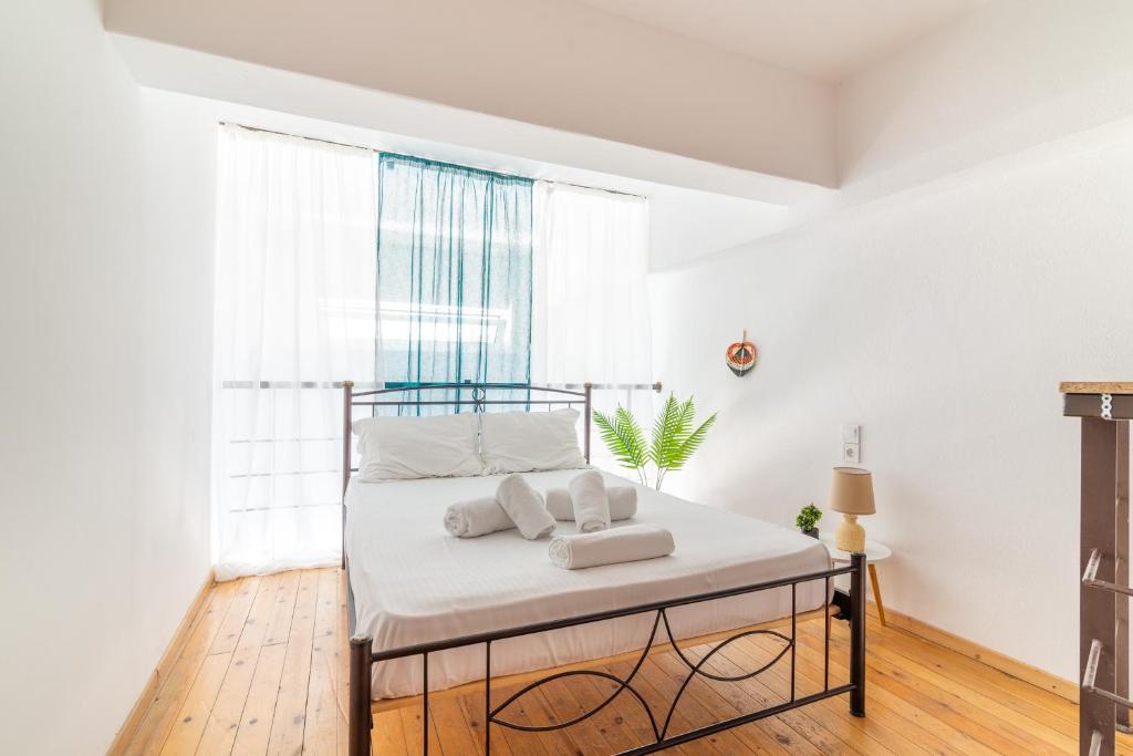 Postel nebo postele na pokoji v ubytování Cozy Loft near Downtown