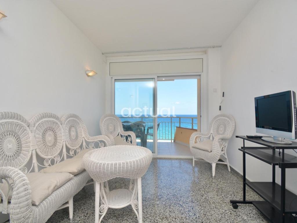 A television and/or entertainment centre at Marina A-4