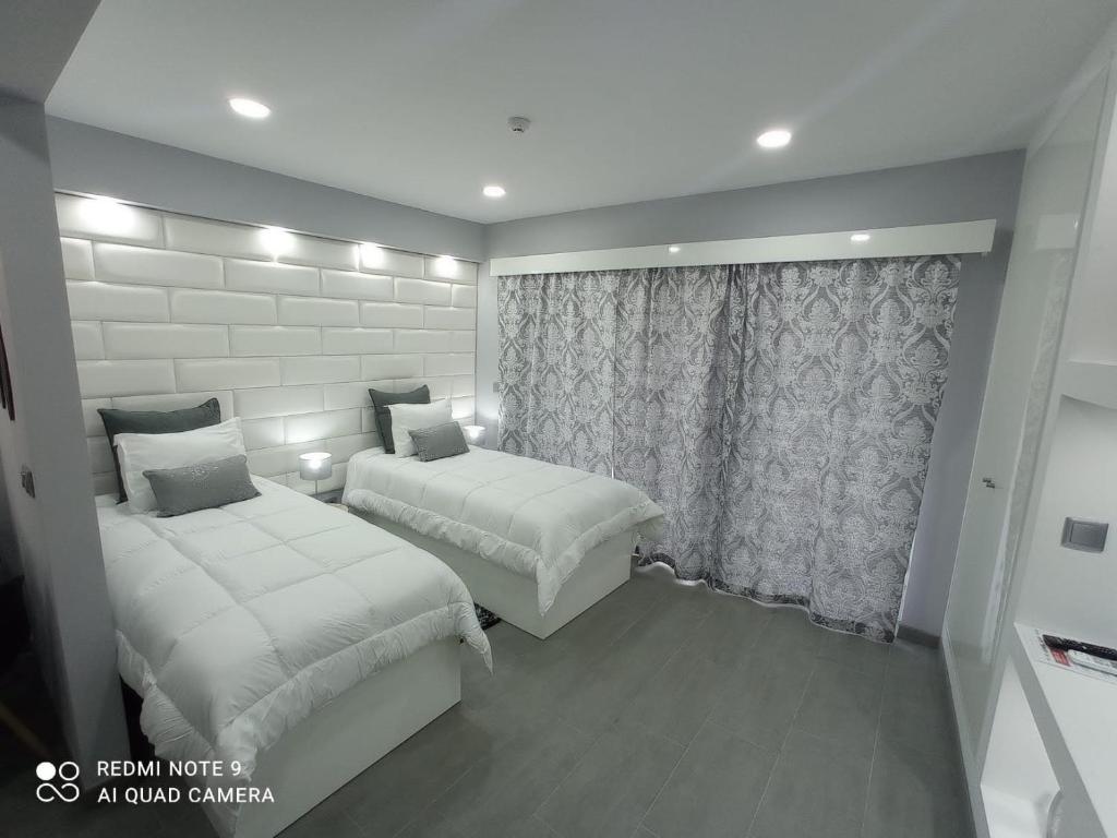 Postel nebo postele na pokoji v ubytování Casa Rua Velha