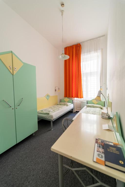 Postel nebo postele na pokoji v ubytování MP Hostel Budapest