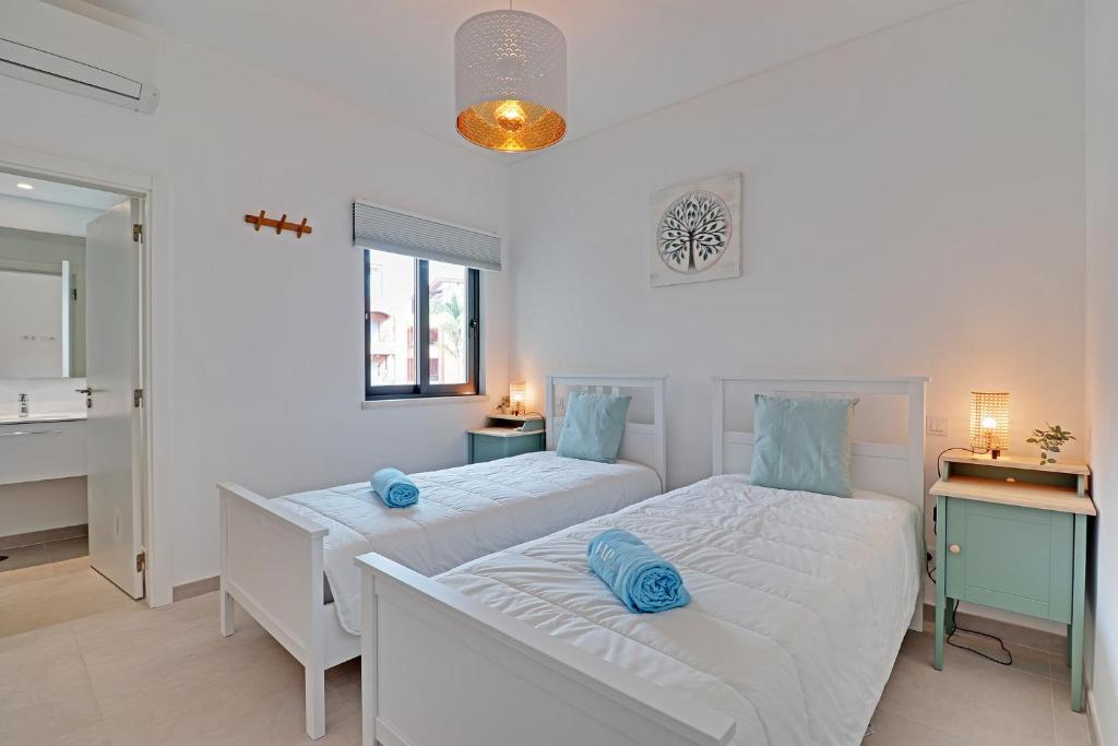 Postel nebo postele na pokoji v ubytování Andiamo Apartment