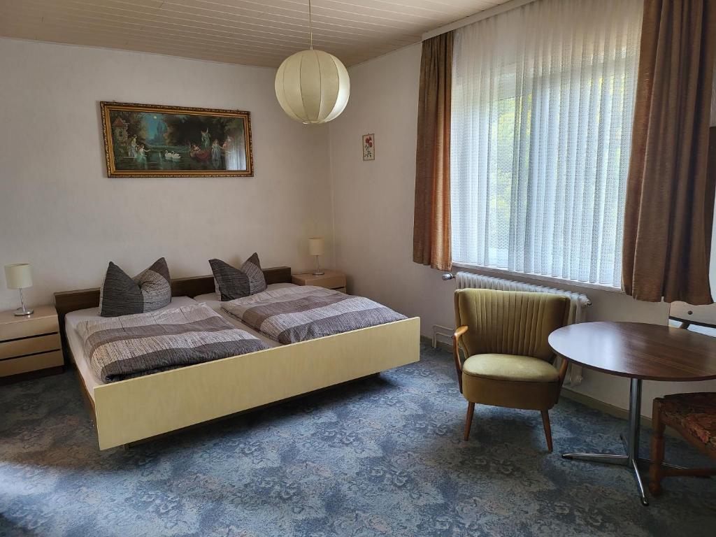 Postel nebo postele na pokoji v ubytování Hotel Zur Schanze