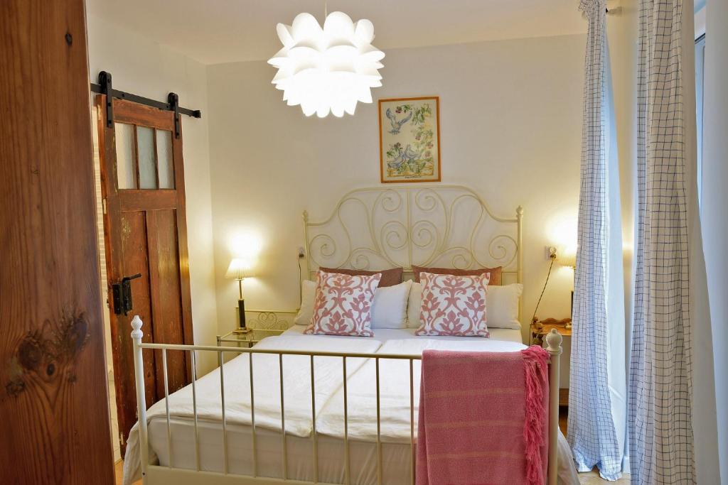 Postel nebo postele na pokoji v ubytování Guest House Wiejska Sielanka