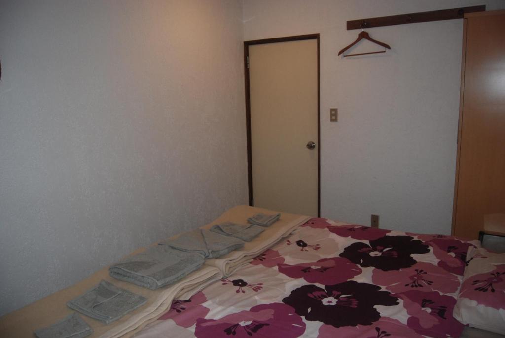 Postel nebo postele na pokoji v ubytování Chalet Myoko