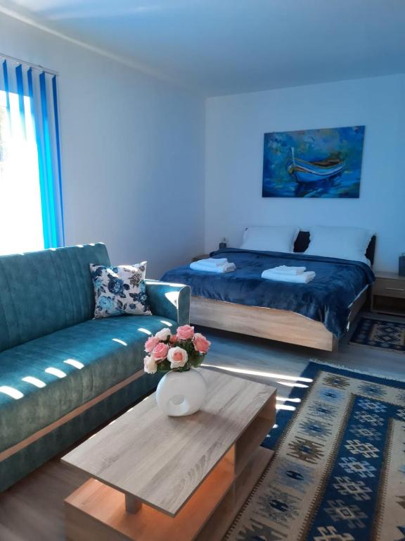 Postel nebo postele na pokoji v ubytování Casa Dobrogea