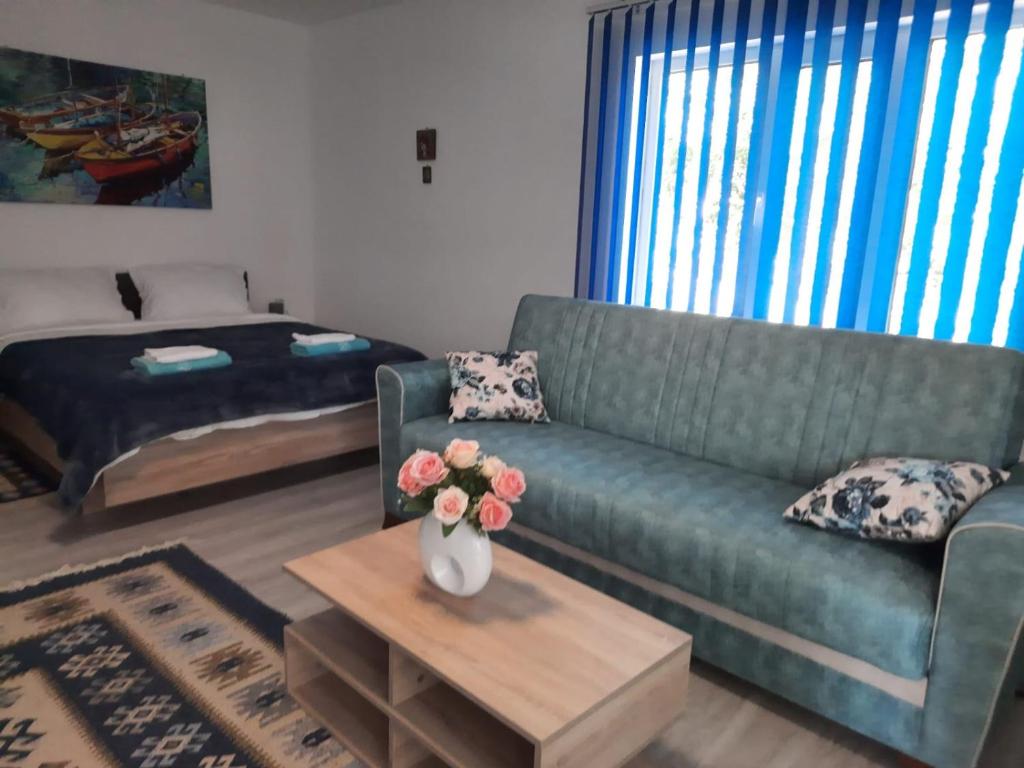 Postel nebo postele na pokoji v ubytování Casa Dobrogea
