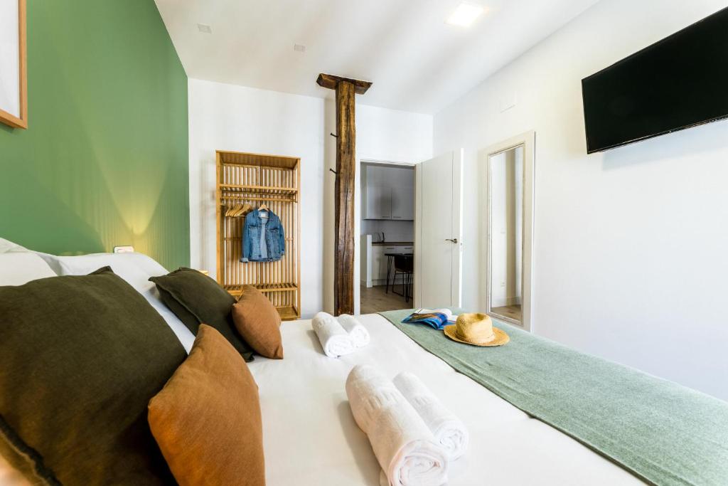 Posteľ alebo postele v izbe v ubytovaní GETARIA by SWEET HOME SAN SEBASTIAN