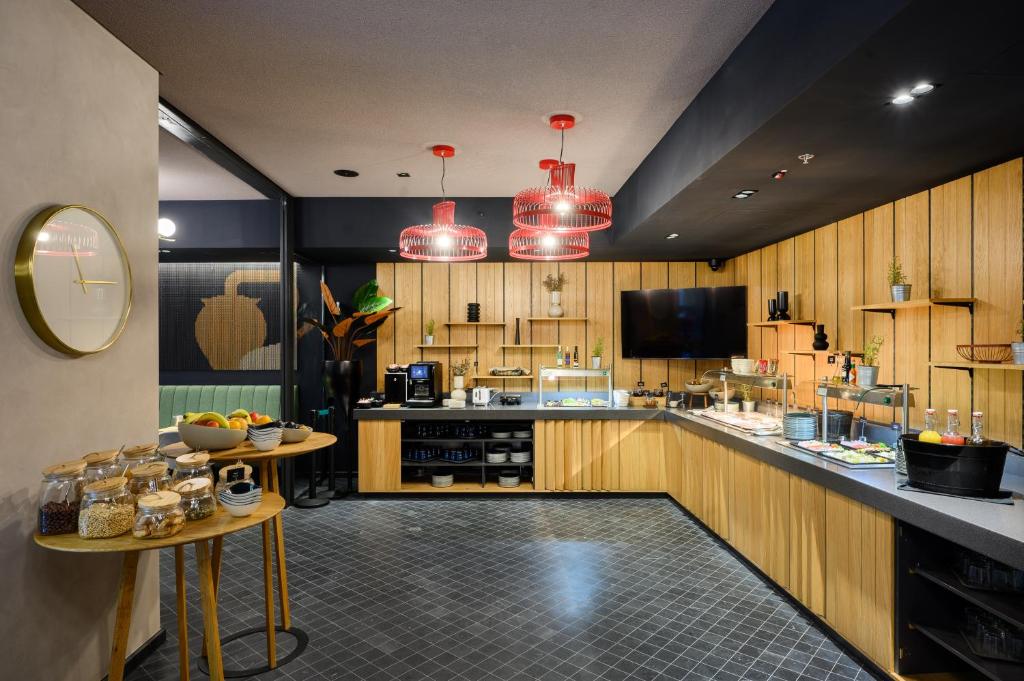 Kuchyňa alebo kuchynka v ubytovaní Hotel Oktogon Haggenmacher by Continental Group